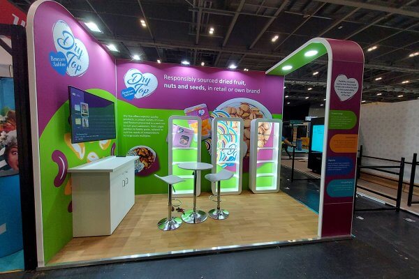 exhibition stand with illuminated shelves and mounted TV