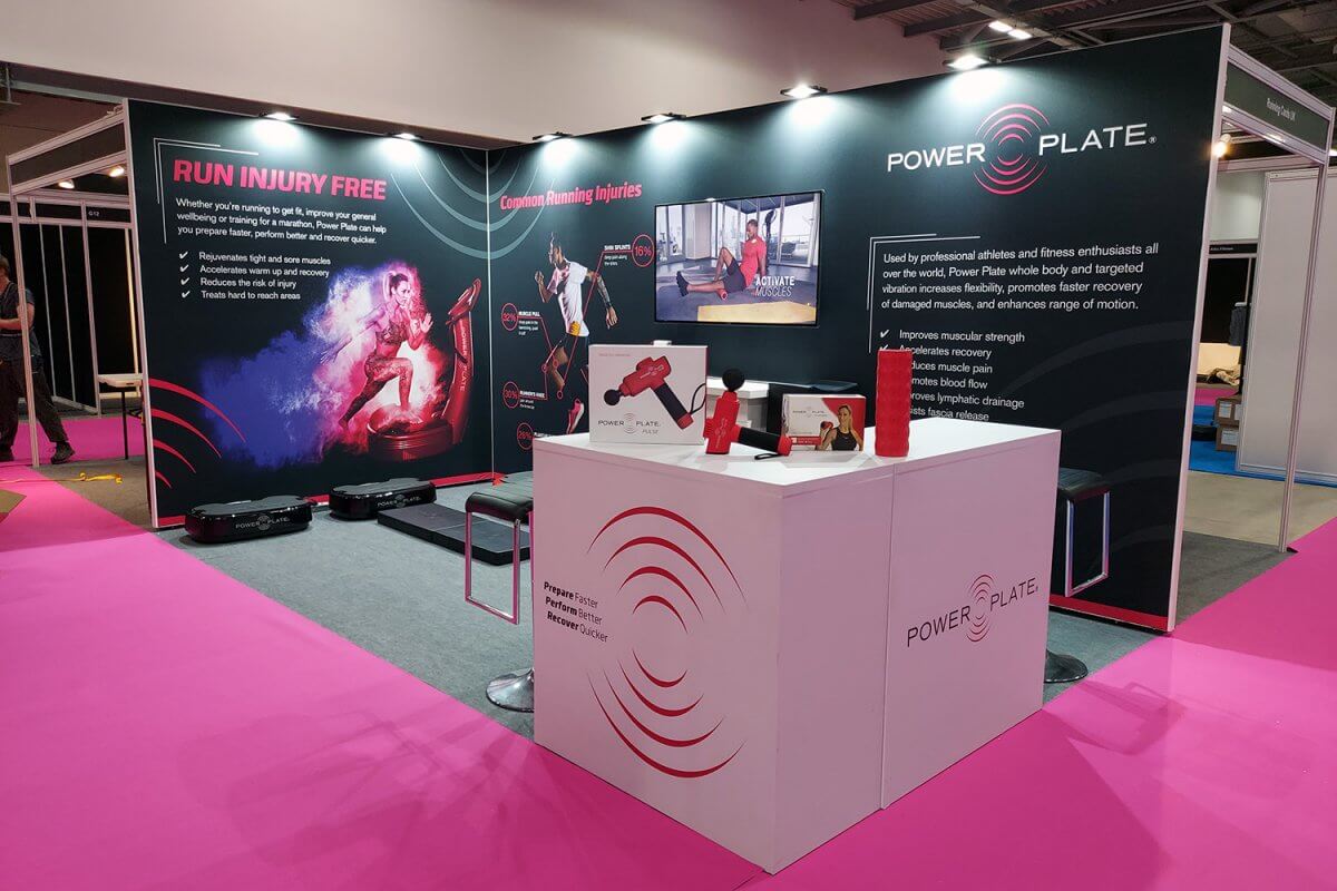 modern exhibition stand covering a shell scheme behind it