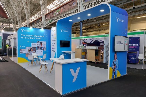 custom built exhibition stand with large archway